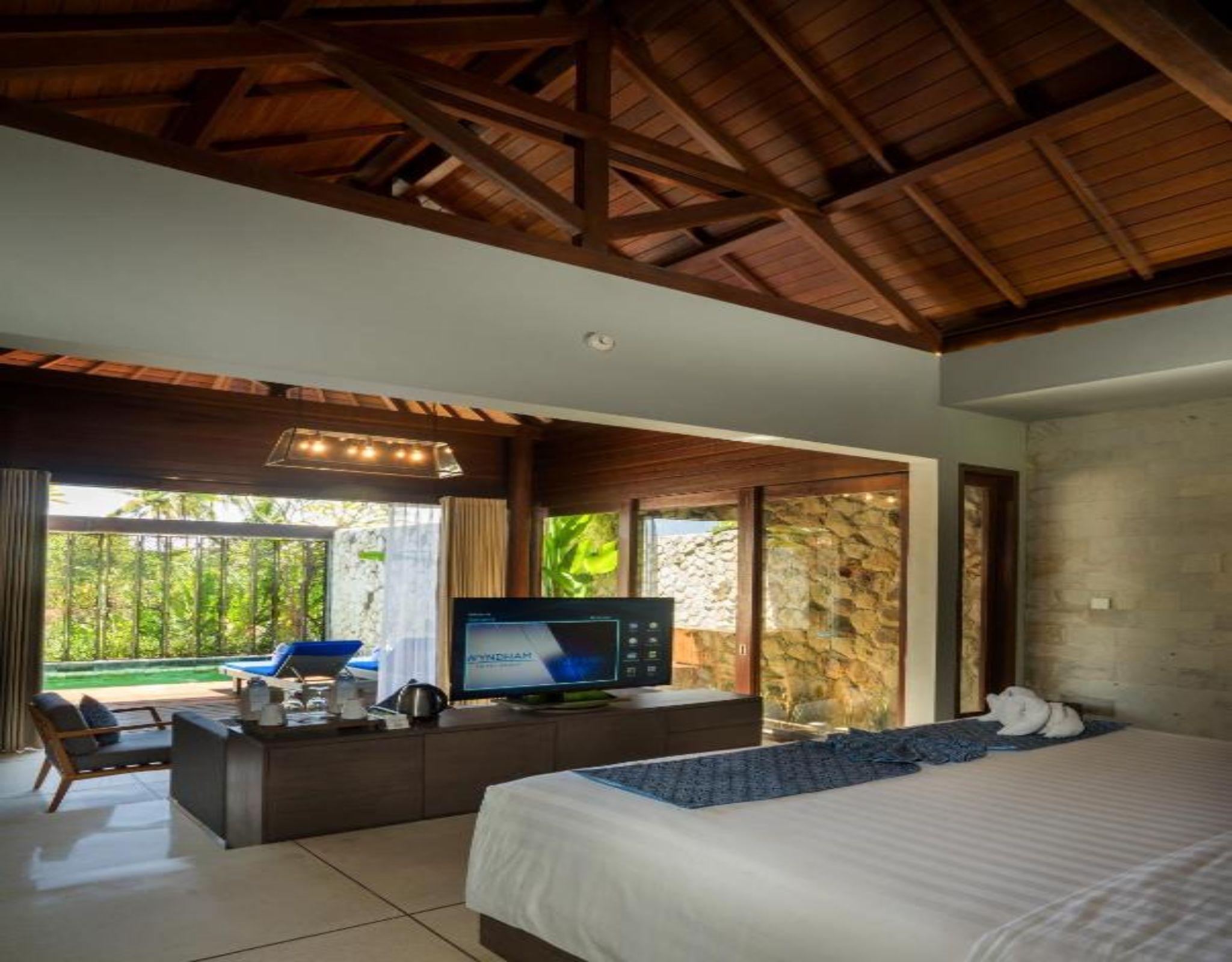 Wyndham Tamansari Jivva Resort Bali Siyut Exterior foto A bedroom at the resort